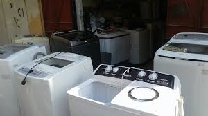 فروع غسالة ملابس يونيفرسال بالعاشر من رمضان 01210999852